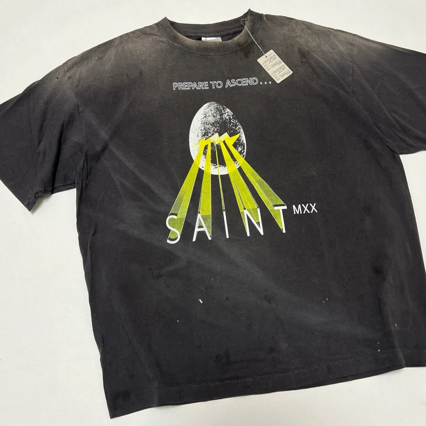 SAINT Mxxxxxx EGG SS TEE/BLK Broken egg shell/SAINT LOGO projection distressed retro short-sleeves Washed black S-XL Correct version Customized co-branded main mark/washed mark/cherub mark Tubular fabric Garment dyeing Rewashing water fading Destroying graffiti Simulating natural distressed effect Top-notch printing technology Washing treatment